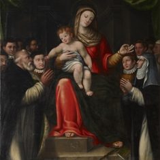 Madonna con il Bambino che porgono un rosario a una monaca e a un monaco barbato